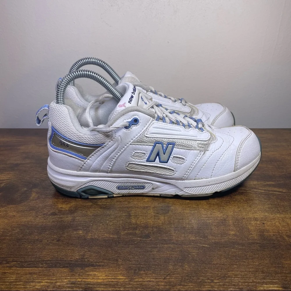 New Balance White Athletic Sneakers with Blue Accents